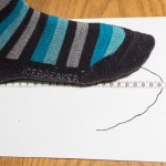 Step 3: Now you can accurately determine the foot length on the edge of the paper from the heel up to the longest toe.